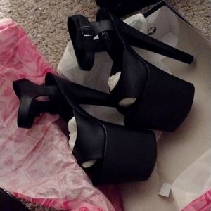High heeled platform shoes.